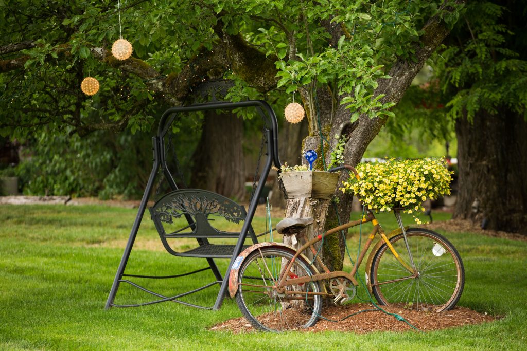 Rustic Wedding Decor with Swing and Antique Bicycle at Wine and Roses Country Estate photographed by Amanda Howse