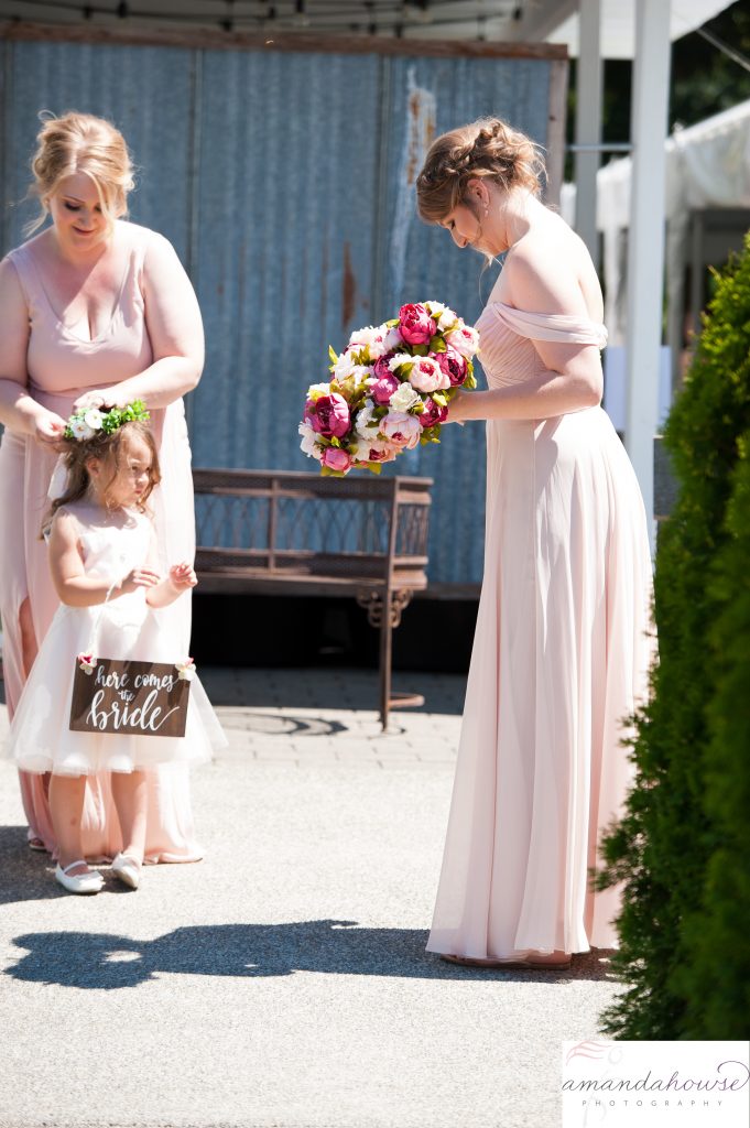 Bridesmaids and Flower Girl getting ready to walk down the aisle at Genesis Farm and Gardens Photographed by Tacoma Wedding Photographer Amanda Howse