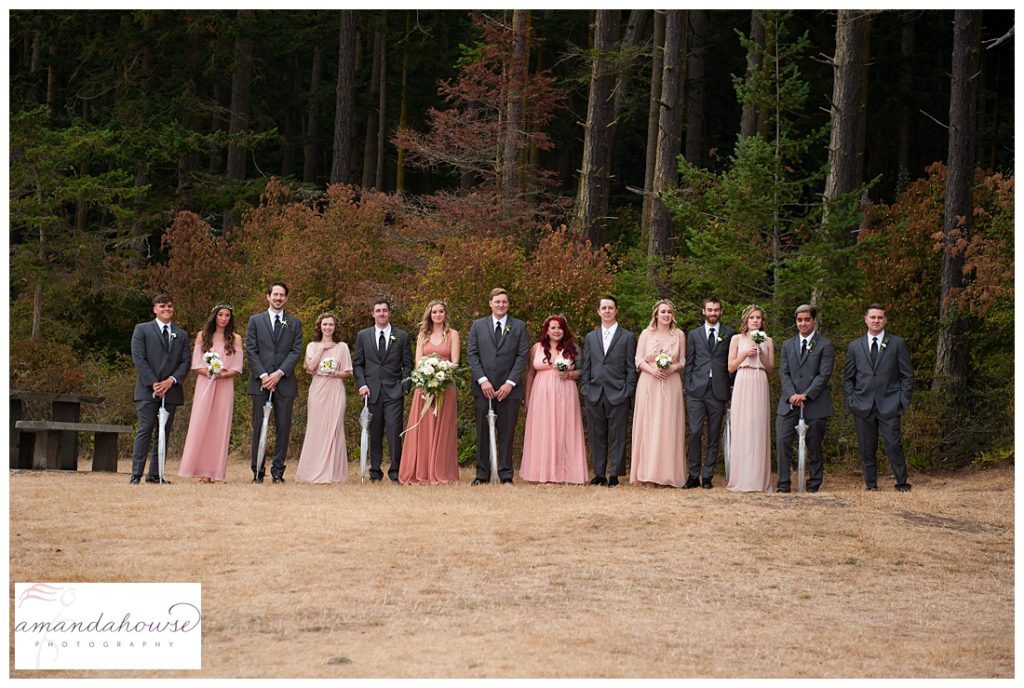 Wedding party portrait with bridesmaids in mismatched blush dresses on Anacortes beach | Photographed by Tacoma Wedding Photographer Amanda Howse