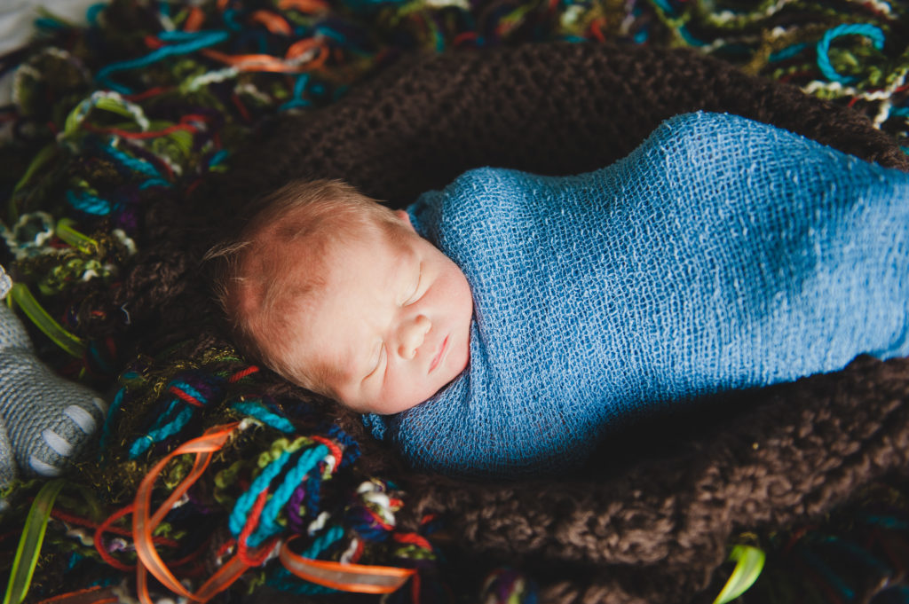 Cozy Newborn Portraits with Blankets | Posing a Newborn for Lifestyle Portraits in Tacoma | Photographed by the Best Tacoma Photographer Amanda Howse Photography