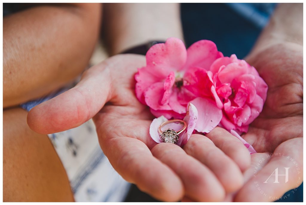 Hands Holding Pink flowers and a Ring | Engagement ring photograph Ideas, Engagement ring inspiration, Flowers and rings | Photographed by the Best Tacoma Engagement Photographer Amanda Howse Photography